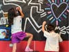 Artists Add to Mural