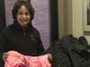 North Shore Civic Ballet board member, Judy Moynihan, shows some outerwear donated to the Marblehead School of Ballet and North Shore Civic Ballet's 2020 winter coat drive.