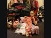 North Shore Civic Ballet board member, Rosemary Grant, holds up some of the new pajamas and winter coats donated to the Marblehead School of Ballet and the ballet company's third annual winter clothing drive.  