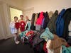 Students from the Marblehead School of Ballet show some of the new pajamas for children and winter coats collected in the 2023 annual drive with the North Shore Civic Ballet. 