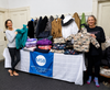 Adora Singh Maharaj and Rosemary Grant, members of the North Shore Civic Ballet’s board of trustees, show some of the winter coats collected with the Marblehead School of Ballet at the sixth annual drive in 2025.