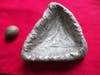This round pebble called a  muller a stone bowl that were each used for grinding are on display in Oxford