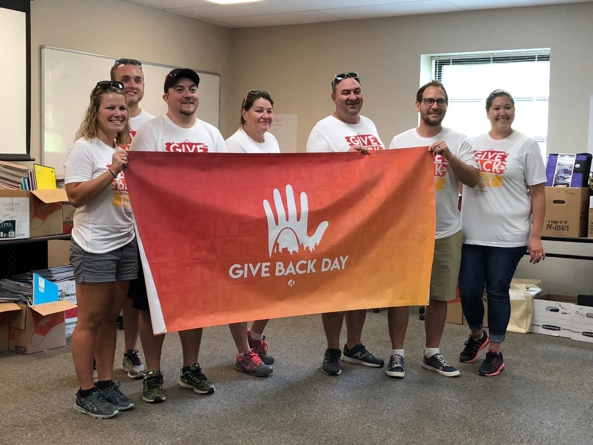 Abstrakt Marketing Group volunteers at recent school supply drive