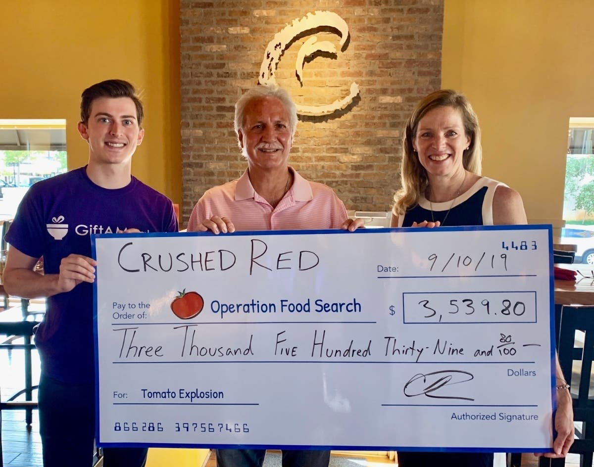 Pictured from left to right is Andrew Glantz, Founder and CEO of GiftAMeal; Chris LaRocca, Founder and CEO of Crushed Red; and Kristen Wild, Executive Director of Operation Food Search.