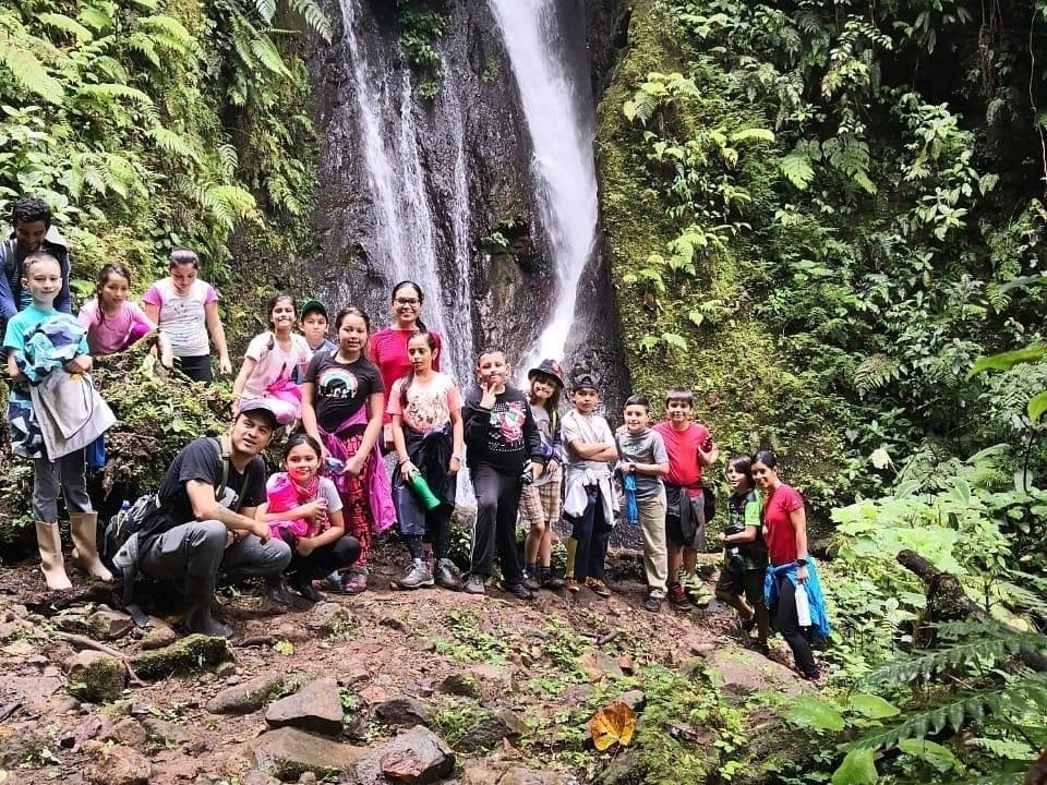 Students from a Friends of the Rainforest ecotour in the rainforest