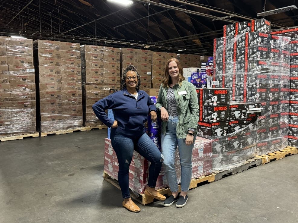 Pictured from left to right are St. Louis Area Diaper Bank Executive Director Muriel Smith and Program Manager Hannah Kramer.