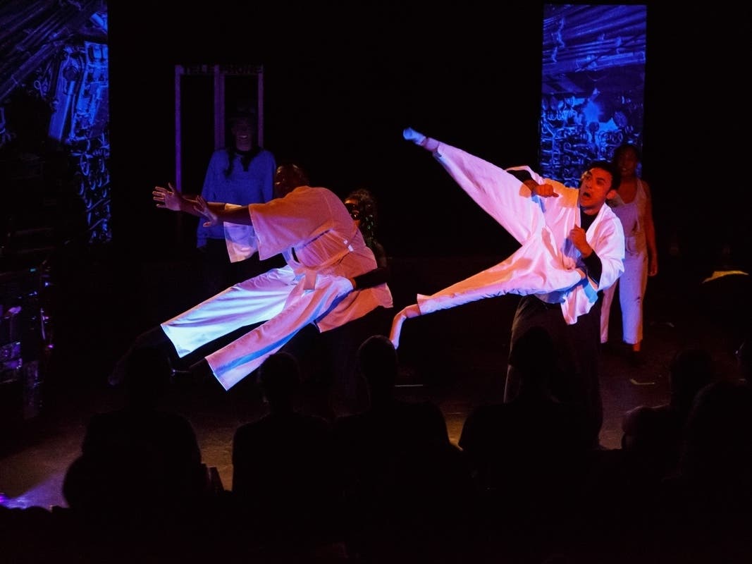 Pictured: (left to right) Tyler DeLoatch and Sean Rickert in the world premiere of THE ONE: THE MATRIX PARODY MUSICAL. 