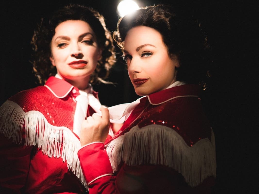 Harmony France and Christina Hall in a publicity image for Firebrand Theatre’s production of ALWAYS… PATSY CLINE. 