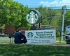 A construction worker takes a break outside North Doylestown Starbucks location, which is closed for renovation