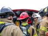 Chief Tim Farrell talks with firefighters during a recent drill.