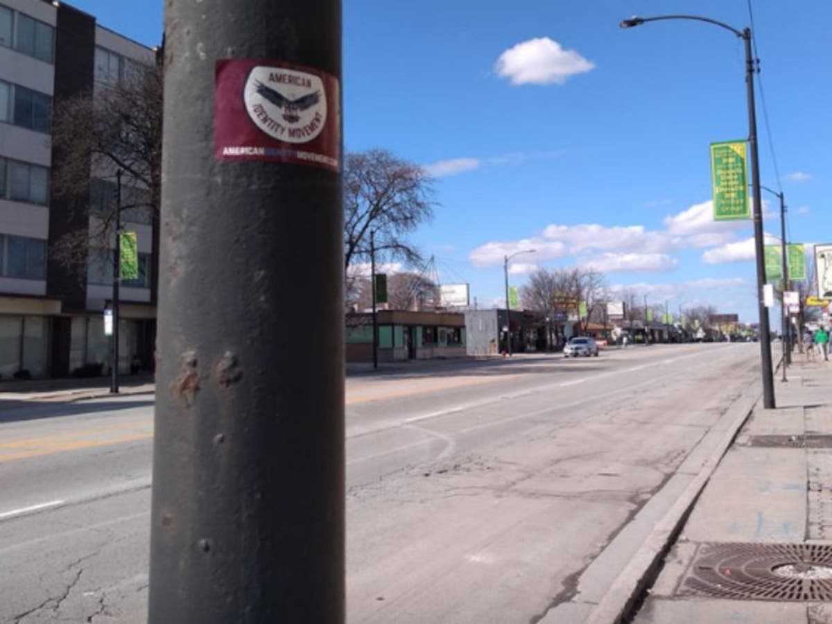 Stickers promoting a white nationalist group were found on a number of poles in the neighborhood.