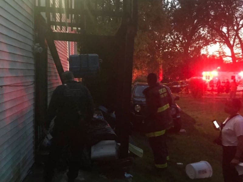 Four injuries were reported after a porch collapse at 117th and Church Wednesday night.