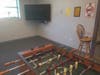 Game room with a TV. 