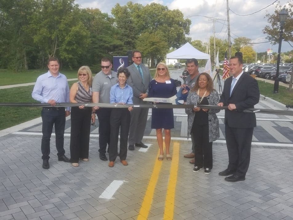 Officials celebrate the unveiling of a new and improved North Street in Tinley Park. 
