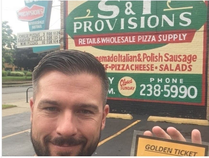 Brian Giaretta, owner of S&T Provisions, holds the coveted golden ticket. 