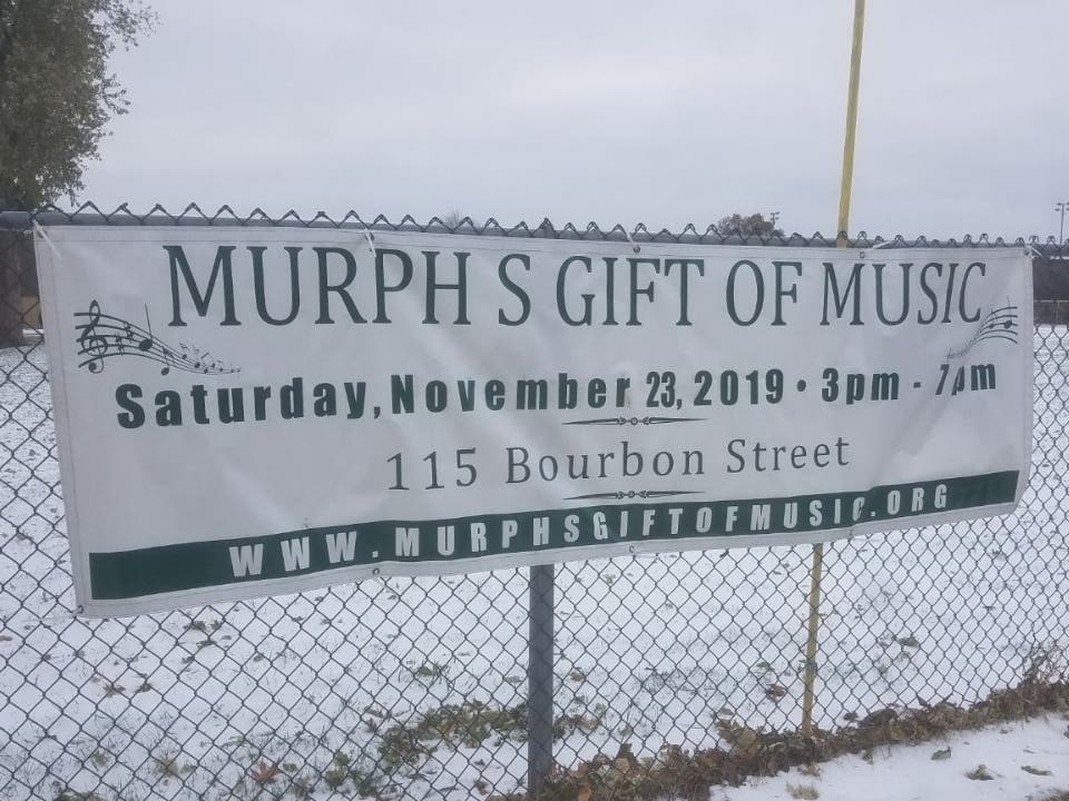 A banner for the upcoming "Murph's Gift of Music" fundraiser placed on the fence at Mt. Greenwood Park. 
