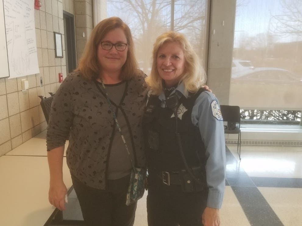 Police Officer Mary Ellen Meuris with Melissa Schofield, the woman whose life she saved. 