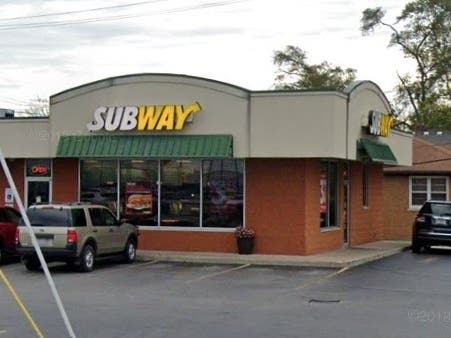 Police arrested two men in connection with an armed robbery at this Subway in Lansing.