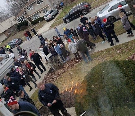 Volunteers lined up to help with delivery day for Tinley Wish. 