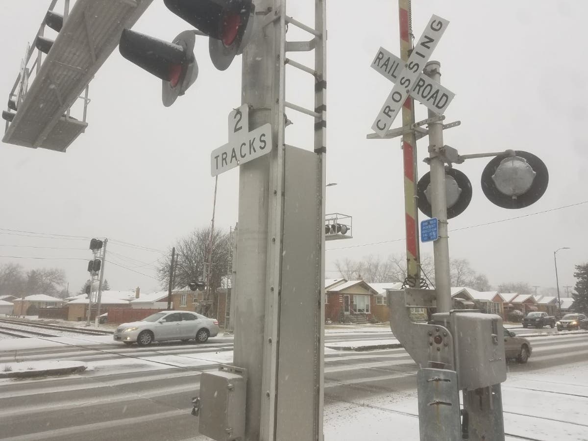 Ald. Matt O'Shea spoke on Capitol Hill about problems rail crossings, like this one at 103rd and Sacramento, have caused.