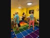 Volunteers work to brighten space