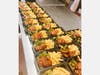 Meals being packaged for delivery to the Shadows Shelter in Ashland