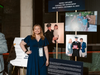 Amanda Capuano (standing in front of father’s display)