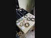 In addition to being a psychic medium, Andrew Anderson also sells energetic jewelry.