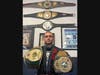 Defiris exhibits the belts he earned as a five-time martial arts champion.  