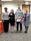 Ryan and Dana Felmet, founders of February Fun Fest, accepting their awards