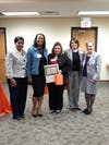 Donna Redman, Robin D'Amore, and Anabela Pinho accepting their award for Garden State Community Bank