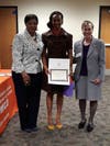Sgt. Mahasin El-Amin accepting her award