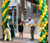 Head of School Nancy Spencer (2020-present) and former Headmaster Mike Murphy (2005-2020) cut the ribbon officially opening the second floor of Charger Commons, as Michael Gillis, Director of Advancement, looks on. 