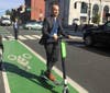 Hoboken Transportation Director Ryan Sharp takes an electric scooter for a ride.