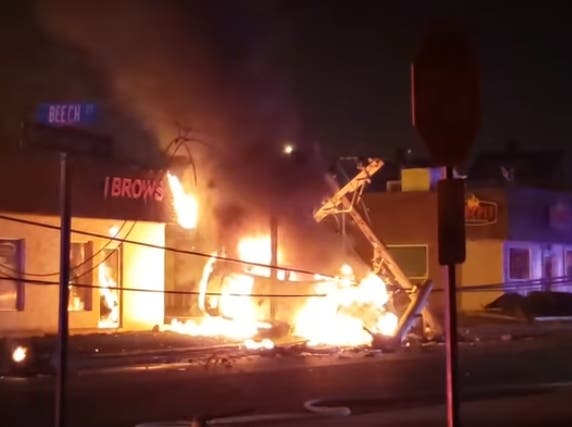 A car crashed into a set of utility poles in Hudson County, NJ early Wednesday morning and burst into flames.