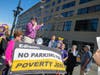 Union members and protesters rally outside Ironside Newark on June 12, 2019.