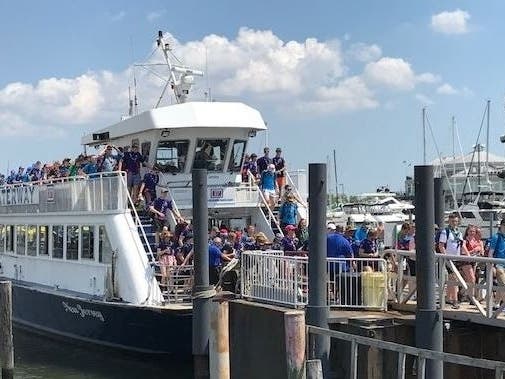Scouts from the United Kingdom disembark a NY Waterway ferry in Jersey City on July 21, 2019.