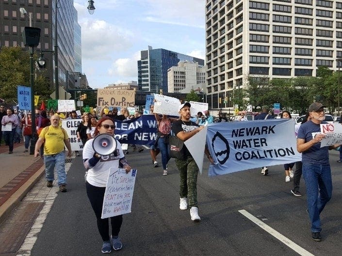 Protesters demand clean water for Newark outside the MTV Video Music Awards in August 2019.