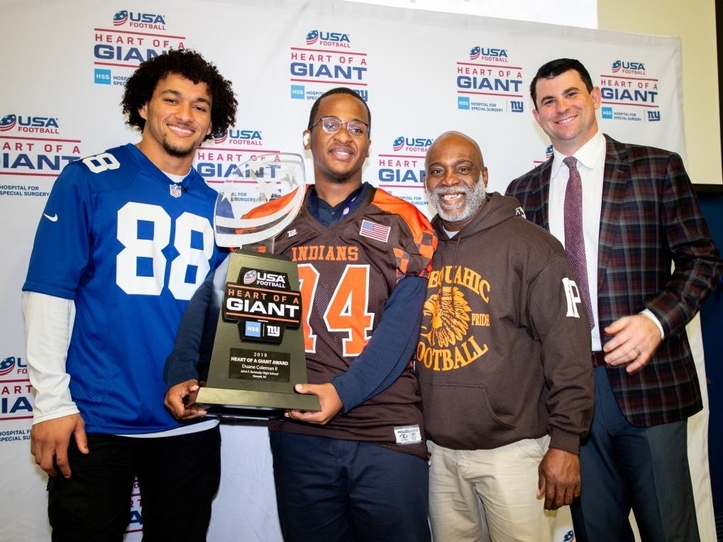 Duane Coleman is presented with the 2019 Heart of a Giant award in Newark, NJ.