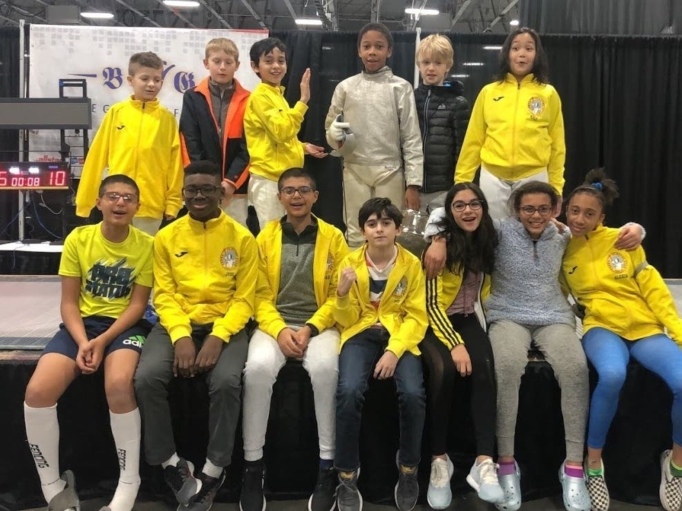 Photo: Devyn Anthony gears up for a match and poses with his clubmates from the Cobra Fencing Club.