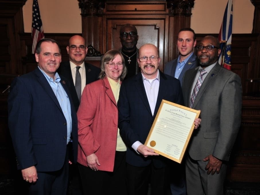 The Essex County Board of Chosen Freeholders honor Karl Hughes of Bloomfield with a commendation.