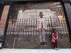 A wave of public murals and artwork is shining a light on social justice issues. Above, “Will You Be My Monument,” a mural on Treat Place in the city’s Central Ward.