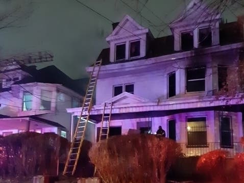 A person died in a house fire in Newark on Friday, authorities said.
