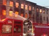 A three-alarm fire caused major damage and collapsed the roof of a commercial building in Newark on Feb. 16.