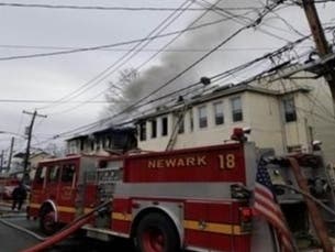 A roof collapsed during a fire in Newark on Tuesday. Six families, including 17 adults and nine children, had to relocate after the blaze.