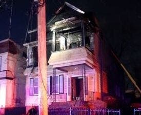 A Newark man has been accused of igniting a pile of clothes with lighter fluid during a home burglary on Sunday night, then throwing them at police officers and trying to make his getaway by jumping off a balcony. Above, a view of the involved home.