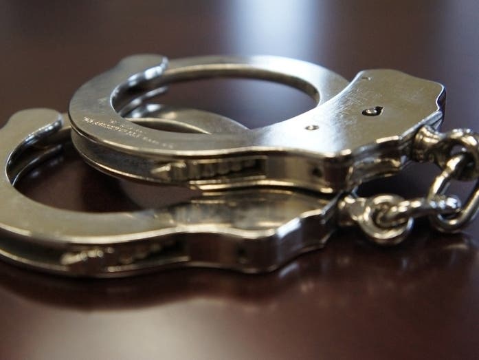 Authorities arrested a man who allegedly shot a Newark resident to death during an attempted robbery, prosecutors said Monday.