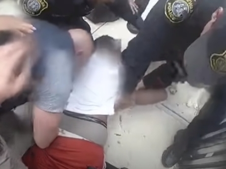 Newark police officers arrest a man in the area of Fabyan Place and Cypress Street on June 1, 2021.