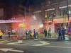 Dozens of firefighters responded to a blaze that started in a Newark restaurant and turned into a two-alarm fire, authorities said Sunday.