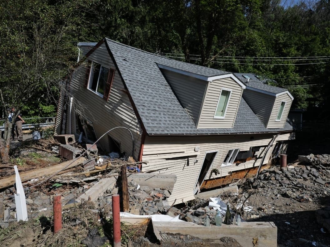 New Jersey officials visit a flood-damaged area in Lambertville on Sept. 5, 2021 after Hurricane Ida.